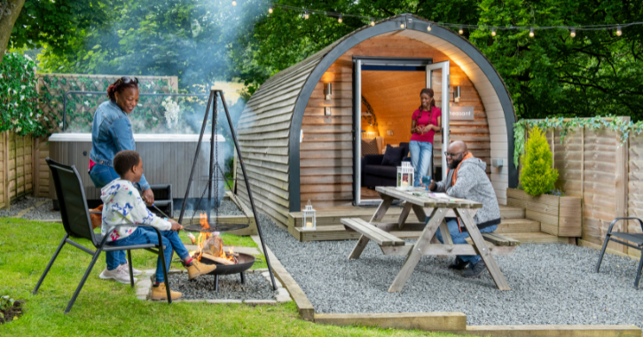 family of four enjoying glamping at West Hall Glamping, County Durham.